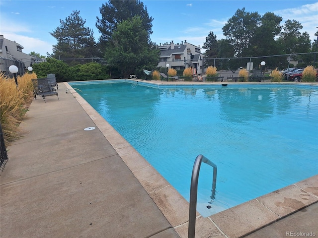 1845 N Kendall St Unit 316D, Lakewood, CO 80214 - view of pool featuring fence