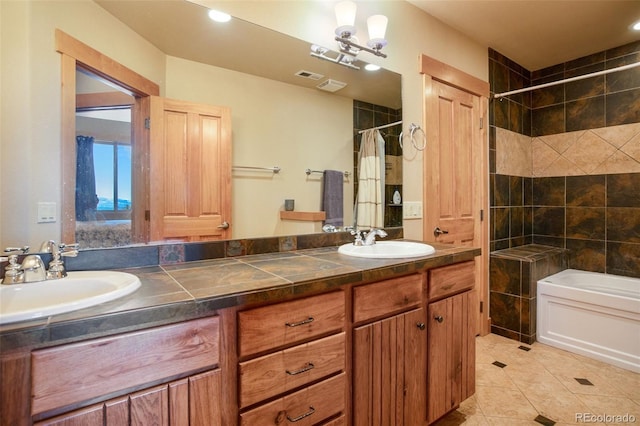 bathroom featuring double vanity and tile flooring