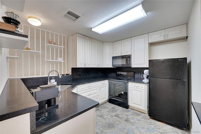 kitchen featuring sink, white cabinetry, backsplash, black appliances, and a textured ceiling