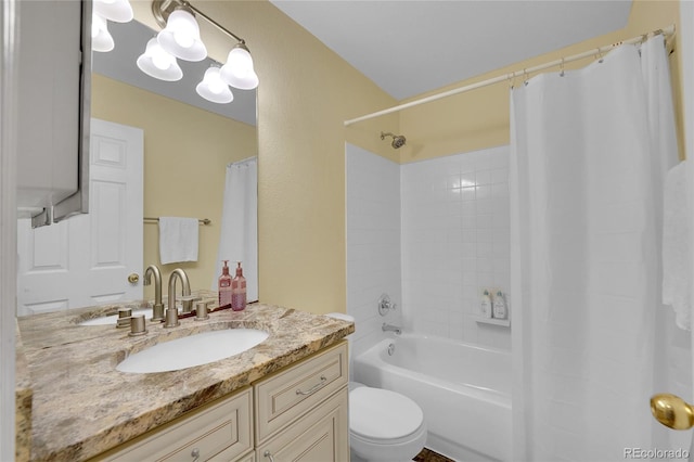 full bathroom with vanity, toilet, and shower / bath combo