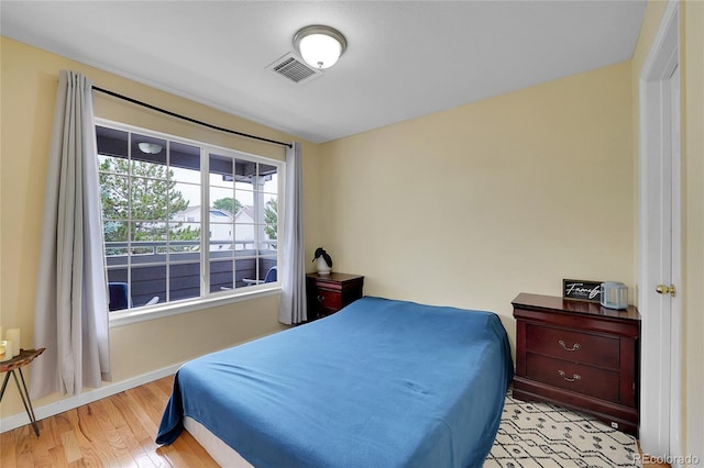 bedroom featuring light hardwood / wood-style floors