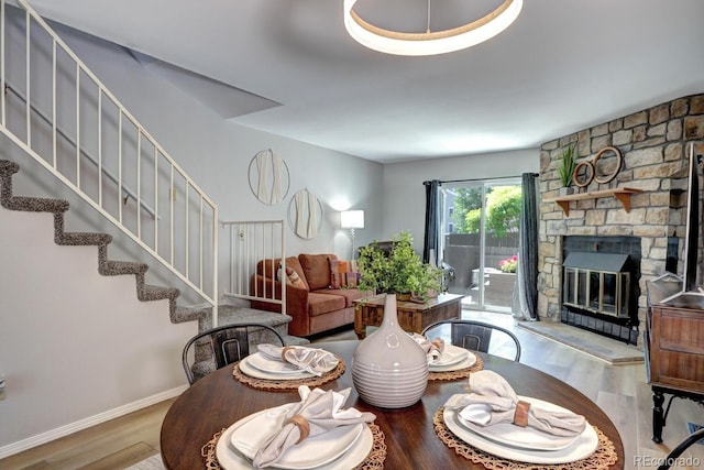 19804 Summerset Ln, Parker, CO 80138 - living area featuring stairs, wood finished floors, and a fireplace