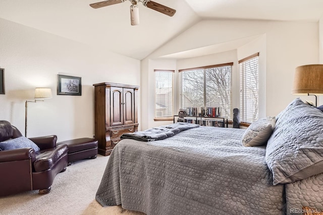 bedroom featuring light colored carpet, a ceiling fan, and lofted ceiling