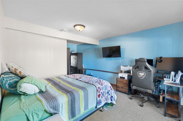 carpeted bedroom with a textured ceiling