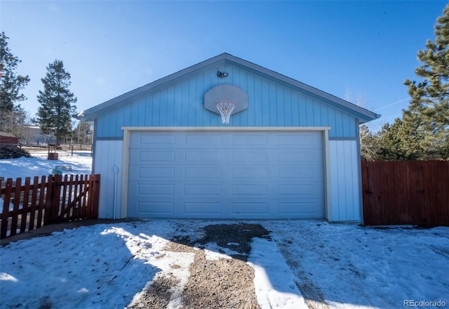 view of snow covered garage