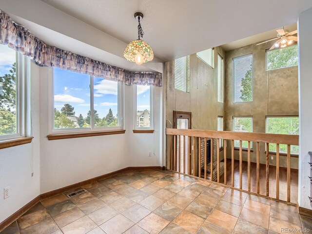 9412 La Quinta Way, Lone Tree, CO 80124 - spare room with baseboards and stone finish floors