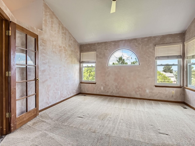9412 La Quinta Way, Lone Tree, CO 80124 - carpeted empty room with vaulted ceiling and baseboards