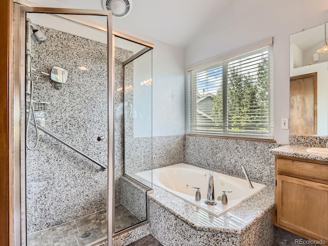9412 La Quinta Way, Lone Tree, CO 80124 - full bathroom featuring vanity, a stall shower, a tub with jets, and vaulted ceiling