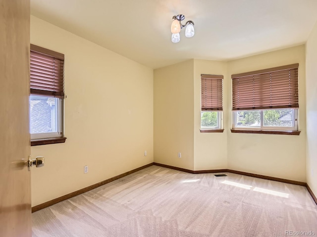 9412 La Quinta Way, Lone Tree, CO 80124 - spare room featuring light carpet and baseboards