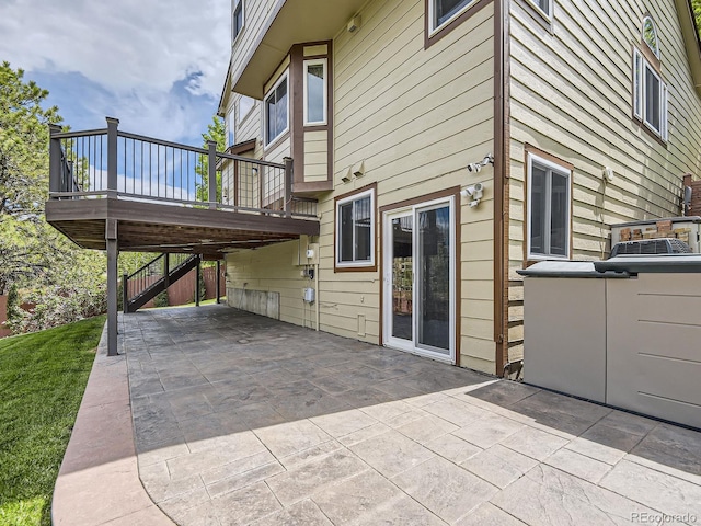 9412 La Quinta Way, Lone Tree, CO 80124 - view of home's exterior featuring a patio area, a deck, and stairway