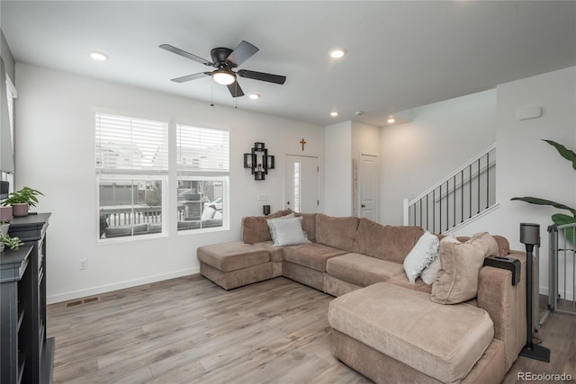 688 N Bersshine Ct, Watkins, CO 80137 - living room with ceiling fan, light wood-style flooring, stairs, recessed lighting, and baseboards