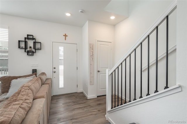 688 N Bersshine Ct, Watkins, CO 80137 - foyer featuring stairs, wood finished floors, recessed lighting, and baseboards