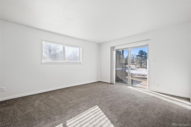 view of carpeted spare room