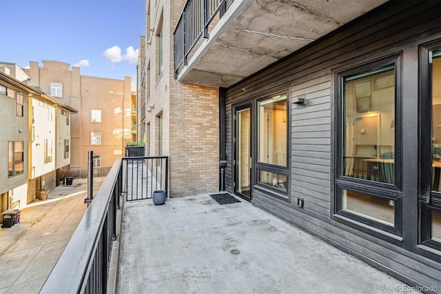 view of patio / terrace with a balcony