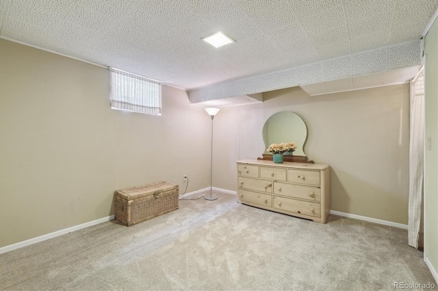 basement with light carpet