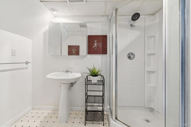 bathroom with a shower with shower door