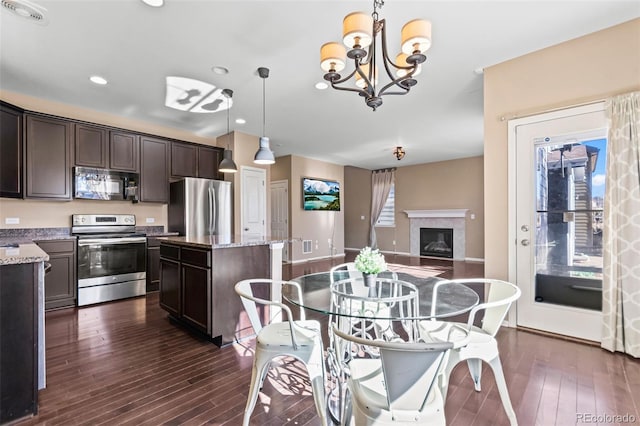 dining space featuring dark hardwood / wood-style floors