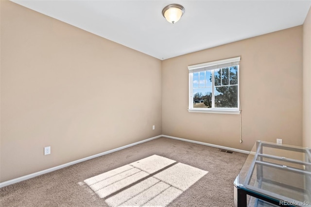 view of carpeted spare room