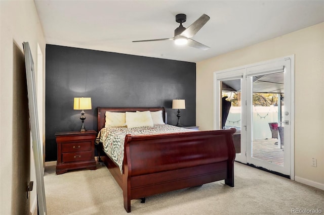 carpeted bedroom with ceiling fan and access to outside