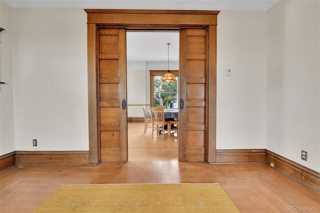 7011 Grandview Ave, Arvada, CO 80002 - spare room featuring wood finished floors and baseboards