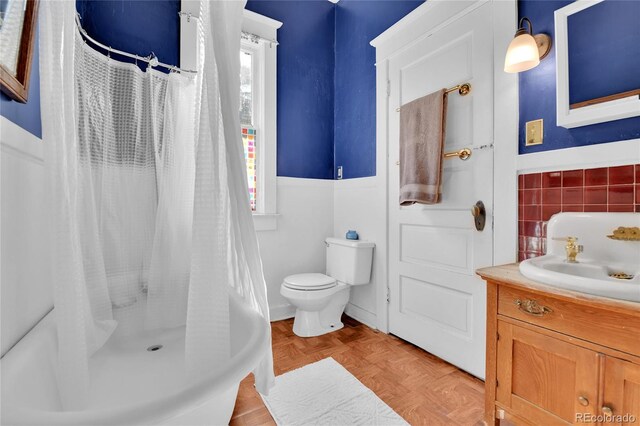 7011 Grandview Ave, Arvada, CO 80002 - full bath featuring vanity and curtained shower