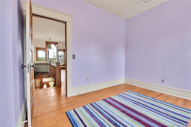 7011 Grandview Ave, Arvada, CO 80002 - unfurnished room with wood finished floors and baseboards