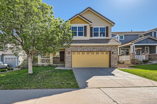 3802 Chaffee Ct, Castle Rock, CO 80109 - view of front of home with driveway, a front yard, a garage, brick siding, and a tiled roof