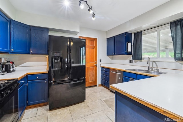 16533 E Baker Pl, Aurora, CO 80013 - kitchen with black appliances, blue cabinetry, and light countertops