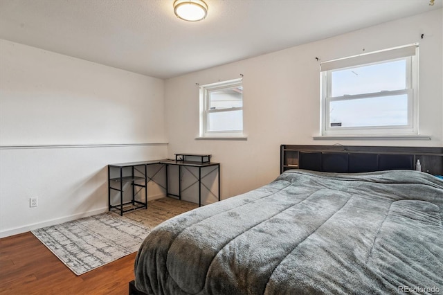 16533 E Baker Pl, Aurora, CO 80013 - bedroom with wood finished floors and baseboards