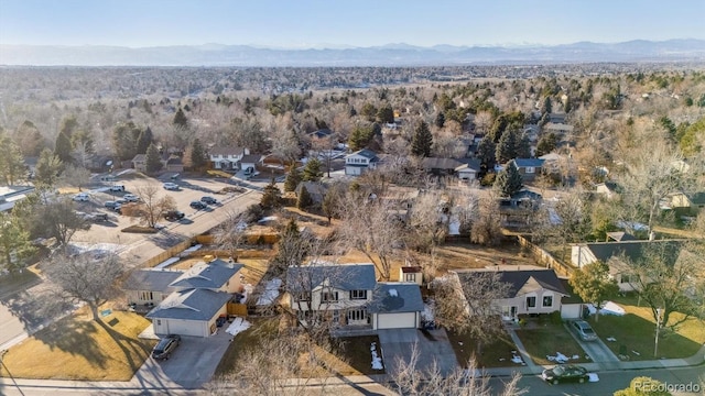 birds eye view of property with a mountain view