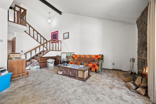 2742 S Xanadu Way, Aurora, CO 80014 - living area featuring high vaulted ceiling, carpet, stairway, beam ceiling, and a textured ceiling
