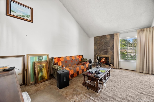 2742 S Xanadu Way, Aurora, CO 80014 - carpeted living area featuring high vaulted ceiling, a textured ceiling, and a stone fireplace