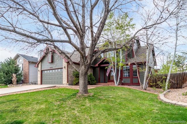 5421 S Vivian St, Littleton, CO 80127 - view of front facade with concrete driveway, an attached garage, and brick siding