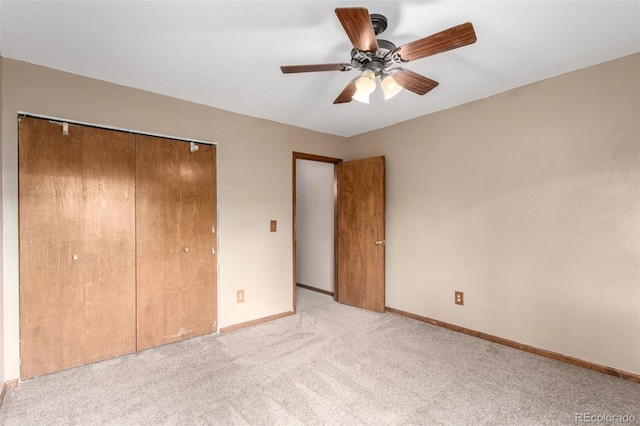 5421 S Vivian St, Littleton, CO 80127 - unfurnished bedroom with a closet, light colored carpet, baseboards, and a ceiling fan