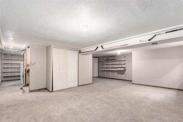 5421 S Vivian St, Littleton, CO 80127 - finished basement with a textured ceiling, carpet, and baseboards