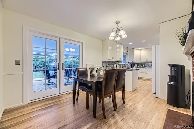 5857 S Logan Ct, Centennial, CO 80121 - dining space with a chandelier, light wood-type flooring, french doors, and recessed lighting