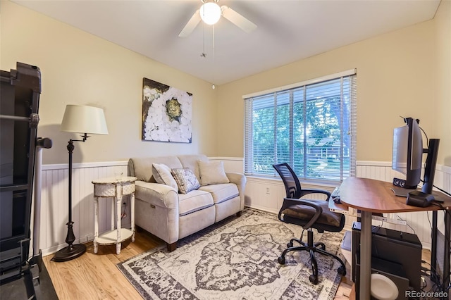 5857 S Logan Ct, Centennial, CO 80121 - home office with wainscoting, wood finished floors, and a ceiling fan