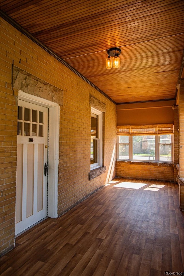 interior space featuring wooden ceiling