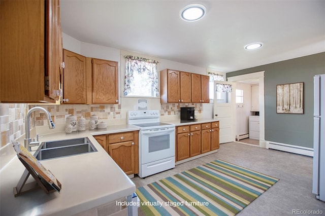 kitchen with white appliances, tasteful backsplash, a baseboard radiator, and sink