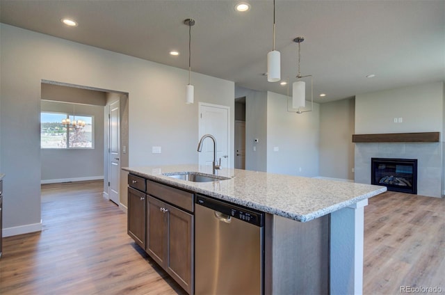 16858 Greyhawk Dr, Monument, CO 80132 - kitchen with a sink, baseboards, stainless steel dishwasher, and recessed lighting