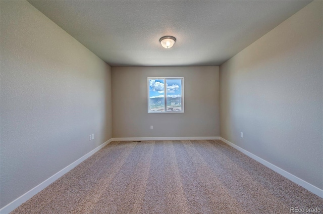 16858 Greyhawk Dr, Monument, CO 80132 - unfurnished room featuring baseboards and light colored carpet