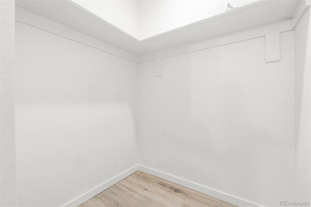 spacious closet featuring light wood finished floors