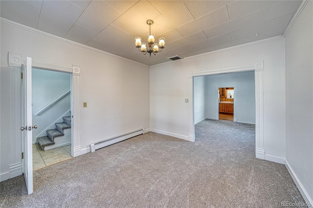 carpeted empty room featuring baseboard heating, a notable chandelier, and ornamental molding