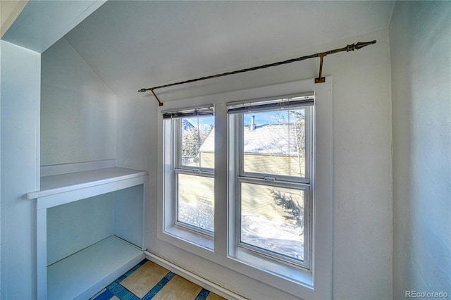 bonus room with vaulted ceiling