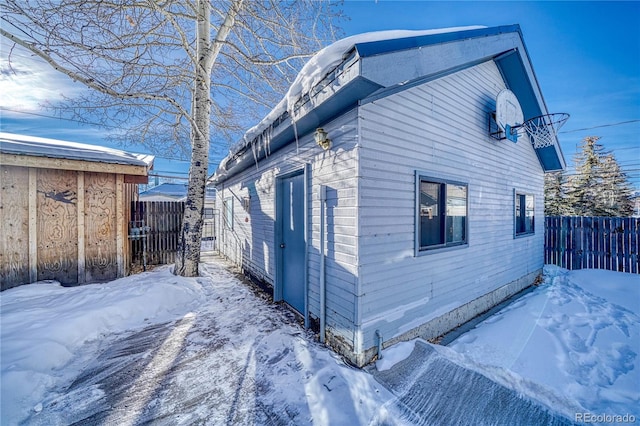 view of snow covered property