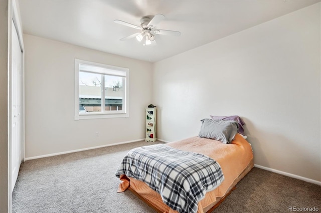 bedroom with baseboards, carpet, and a ceiling fan