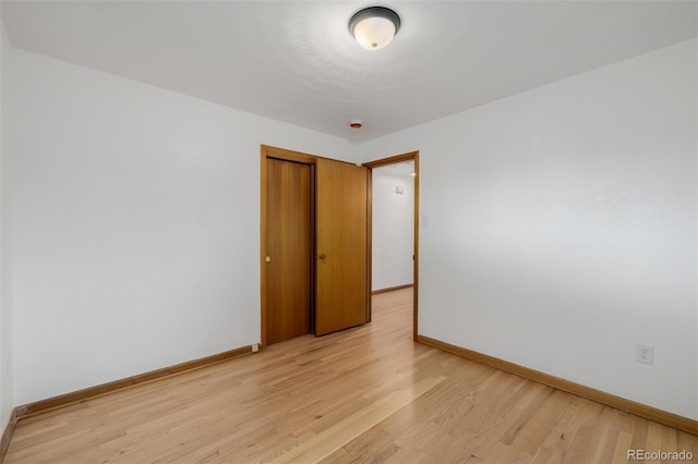 6994 Teller Ct, Arvada, CO 80003 - empty room featuring baseboards and light wood-type flooring