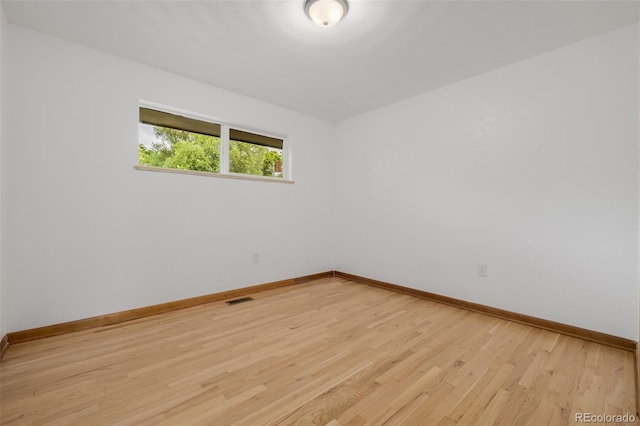 6994 Teller Ct, Arvada, CO 80003 - spare room with baseboards and light wood-style floors