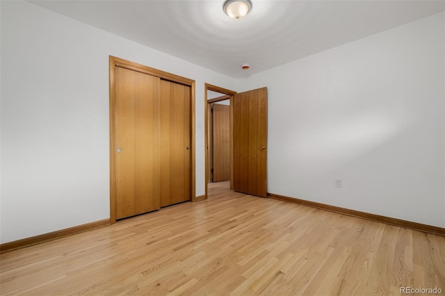 6994 Teller Ct, Arvada, CO 80003 - unfurnished bedroom featuring light wood-type flooring and a closet