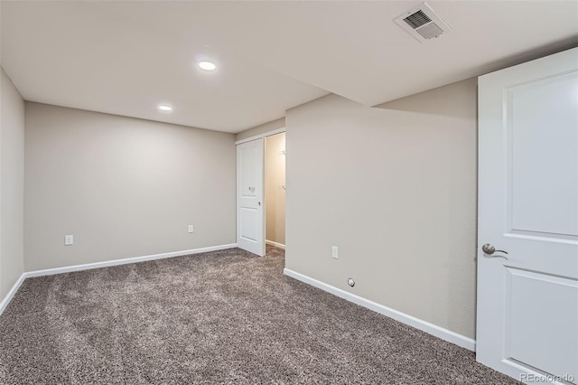 interior space featuring carpet, visible vents, baseboards, and recessed lighting